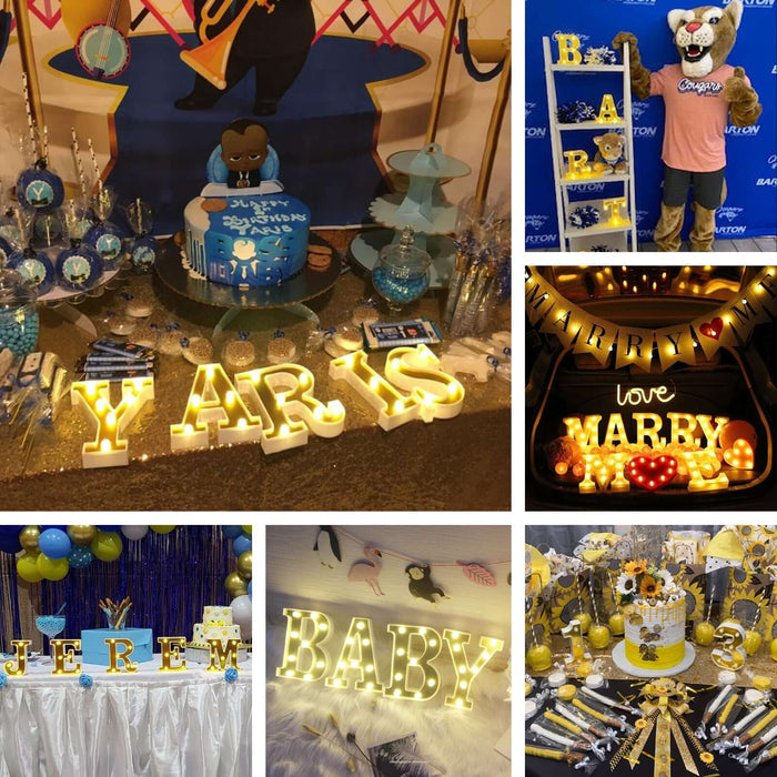 Colorful baby shower decorations with illuminated letters and themed cake displays.