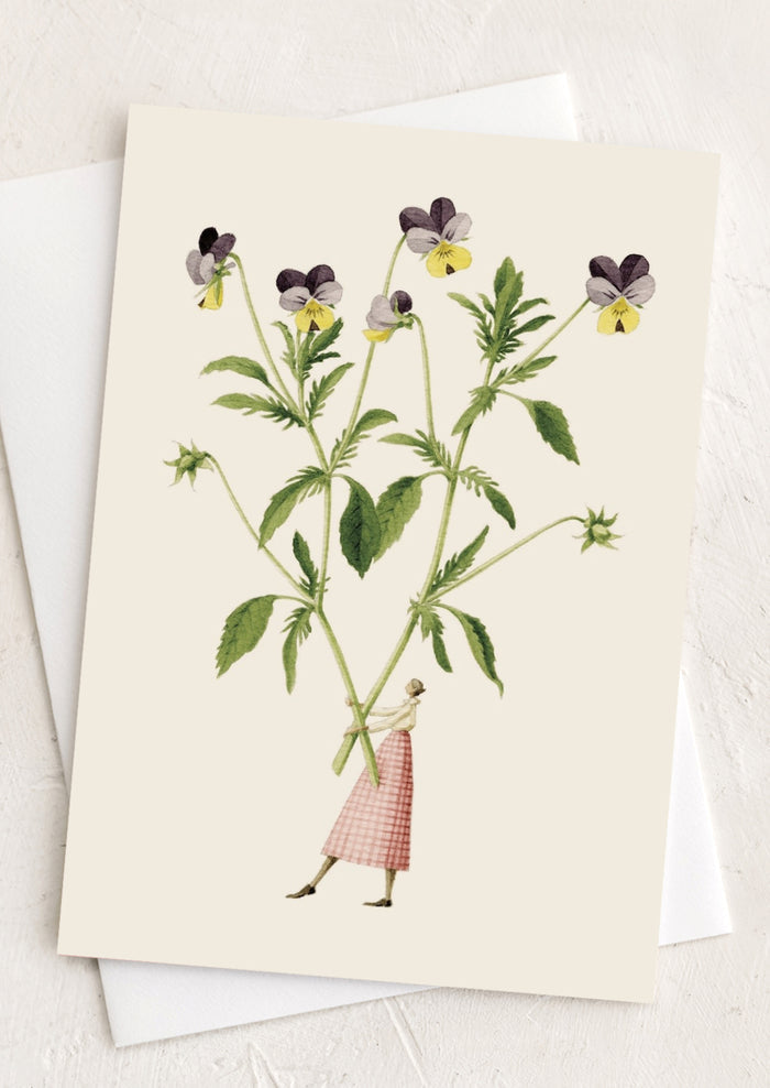 Greeting card with botanical illustration of flowers and a person holding them, on a white background.