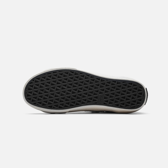 STRAYE SKTP.01 Black – outsole bottom view showing grip pattern