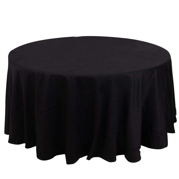 Round black tablecloth with elegant draping for dining or event use.
