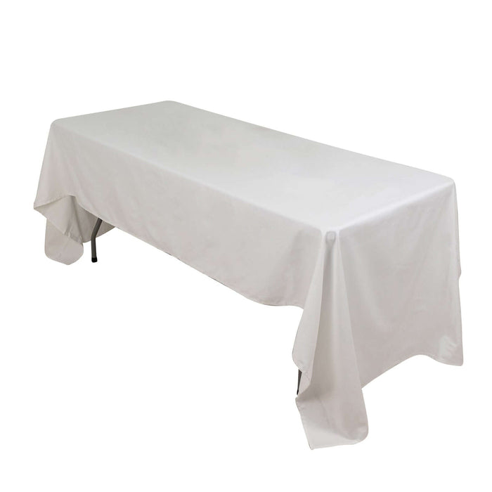 White rectangular table covered with a tablecloth