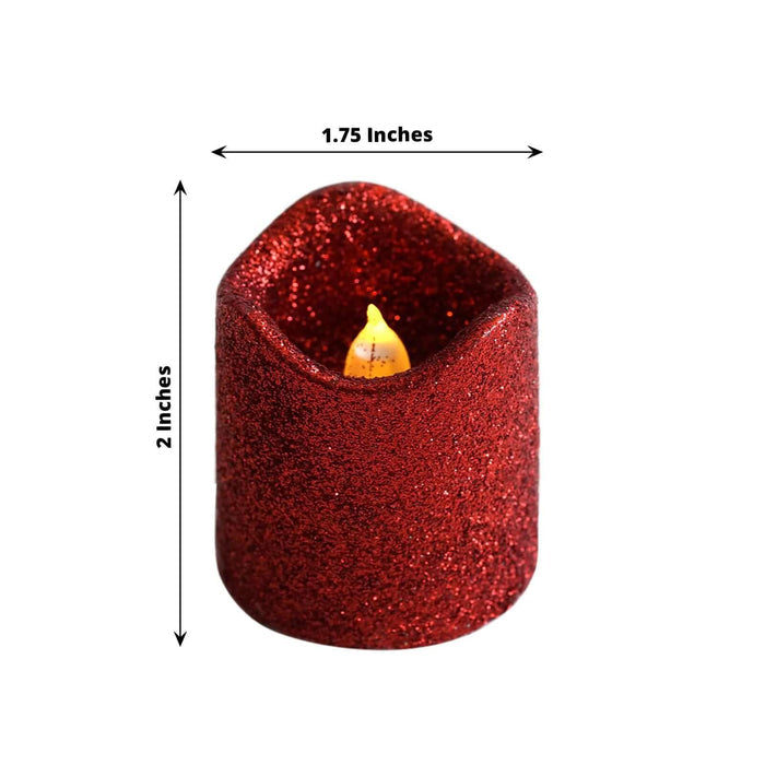 Red glitter candle with flickering flame, 1.75 x 2 inches.
