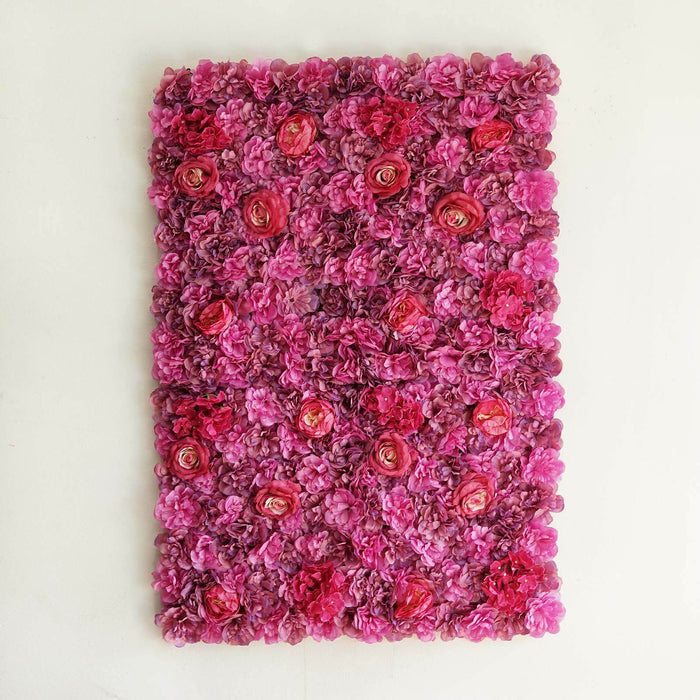 Pink floral wall art with various blooms and textures.