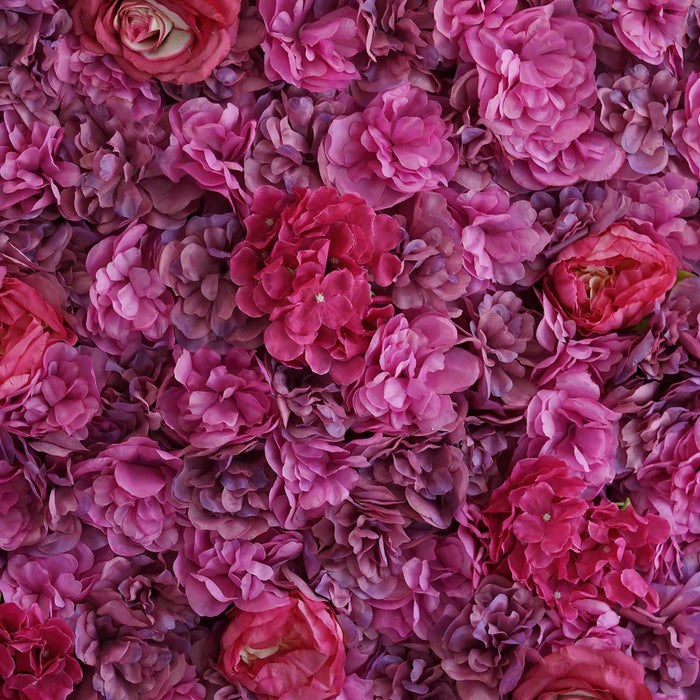Vibrant pink flower arrangement with various blooms and textures. #whtbkgd