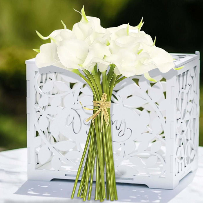 White calla lily bouquet with green stems tied with twine