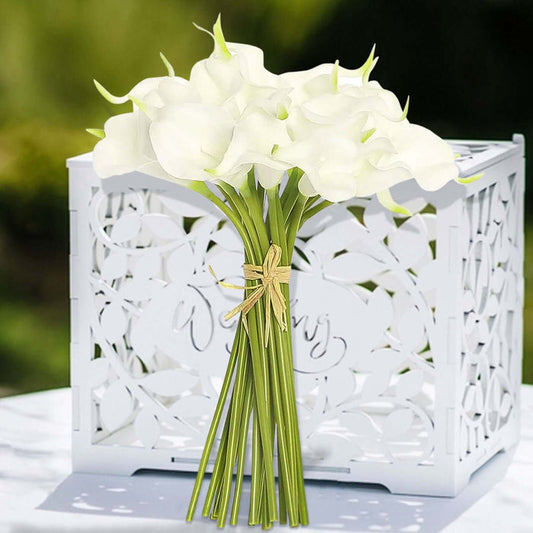 White calla lily bouquet with green stems tied with twine