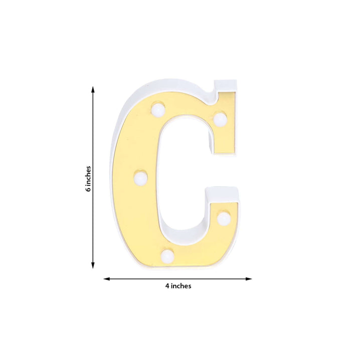 Gold and white decorative letter "C" cutout, 6x4 inches.