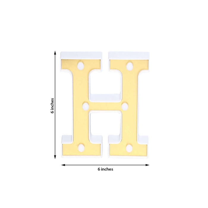 Yellow and white decorative letter "H", 6 inches tall.