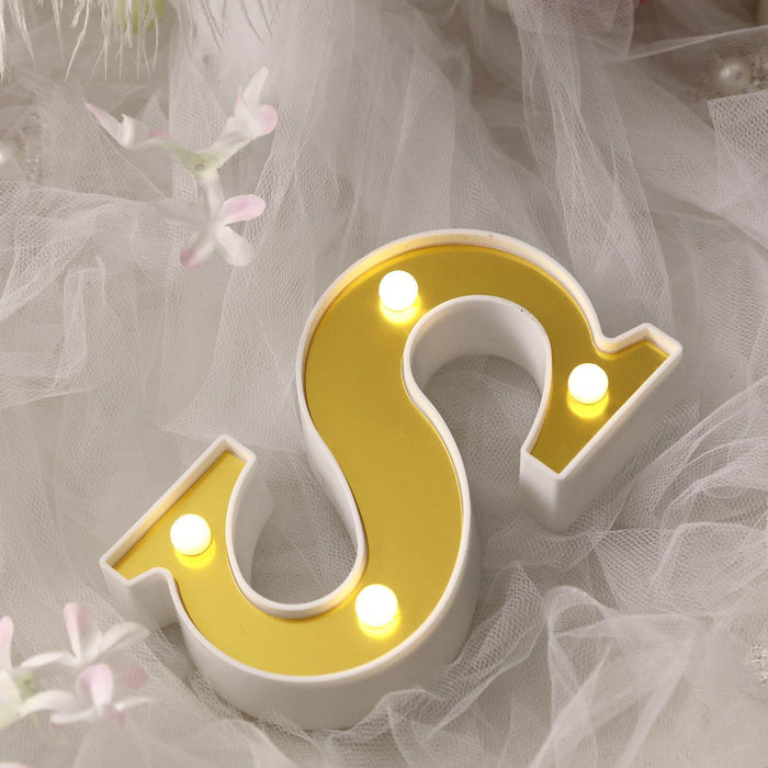 Decorative yellow and white LED dollar sign accent piece