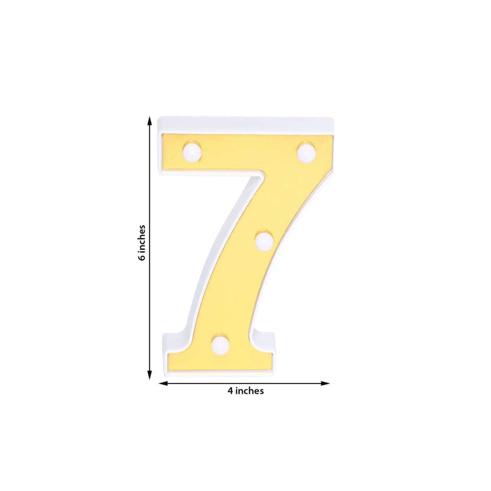 Yellow number 7 cutout on white background, 6 inches tall and 4 inches wide.