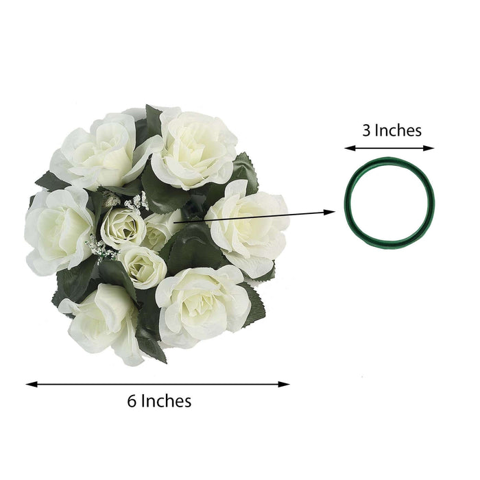 White artificial flower bouquet with green floral ring, 6 inches wide.