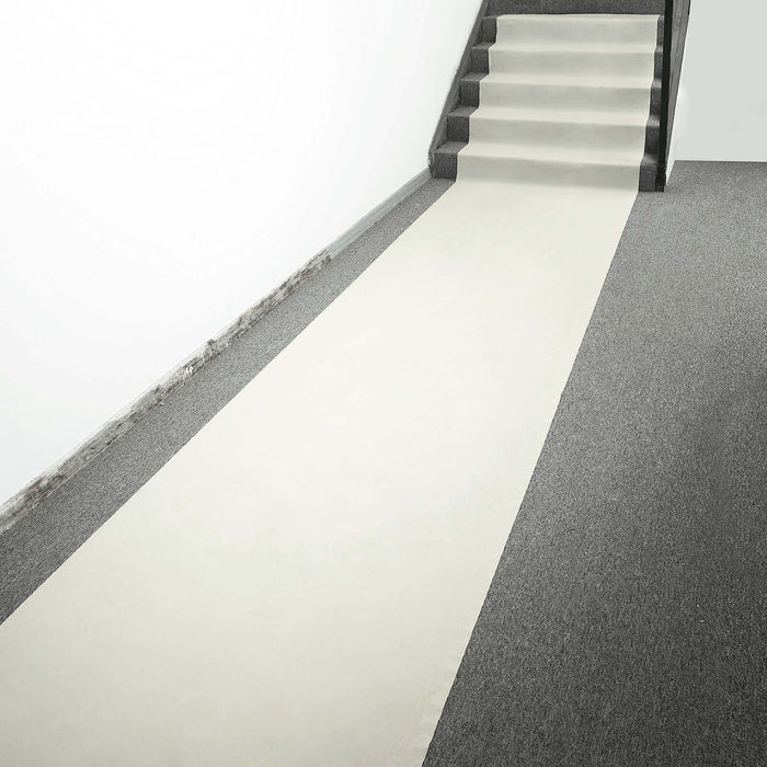 Neutral carpet runner on stairs and landing for home decor