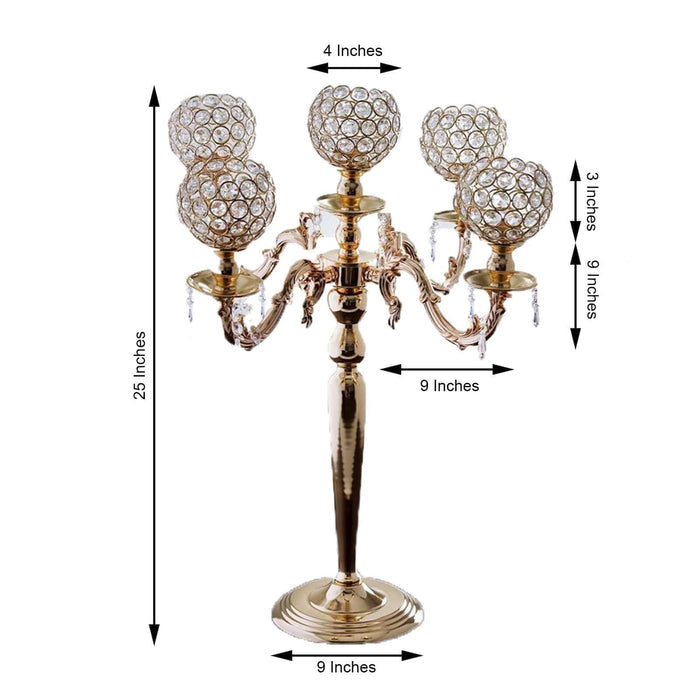 Elegant gold candelabra with crystal globes, 25 inches tall and 9 inches wide.
