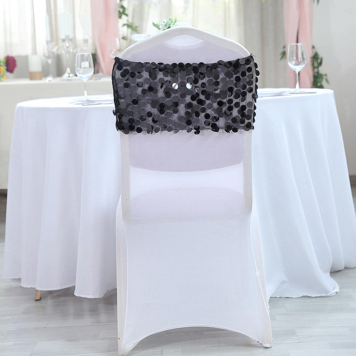 Elegant black polka dot chair cover for events and celebrations.