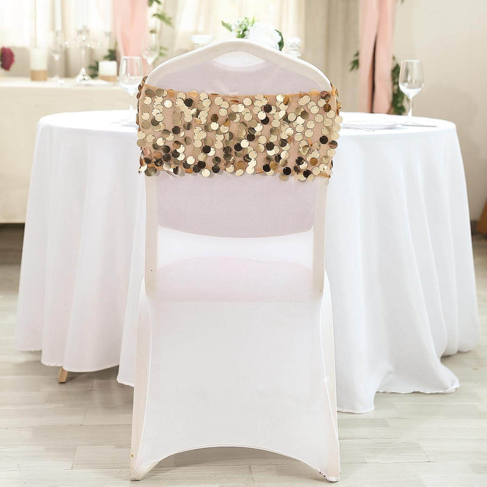 Decorative chair cover with gold sequins for events and celebrations.