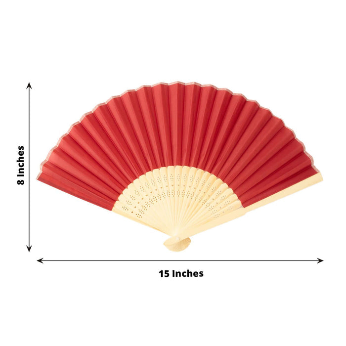Red folding fan with bamboo handle, 15 inches wide and 8 inches tall.