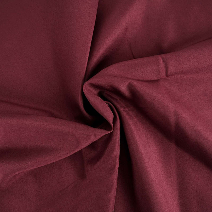 Burgundy fabric texture with soft, smooth draping. #whtbkgd