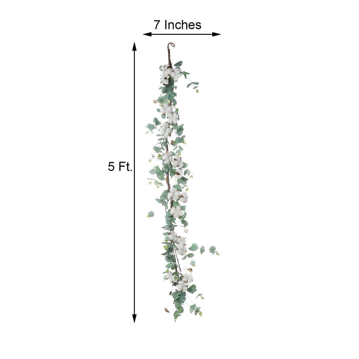 Hanging artificial greenery vine with white flowers, 5 ft long and 7 inches wide.
