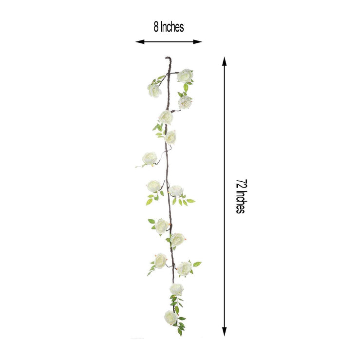 Artificial floral garland with white flowers and green leaves, 8x72 inches.