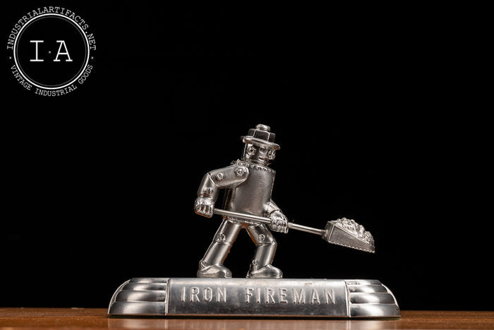 Antique Iron Fireman Ashtray