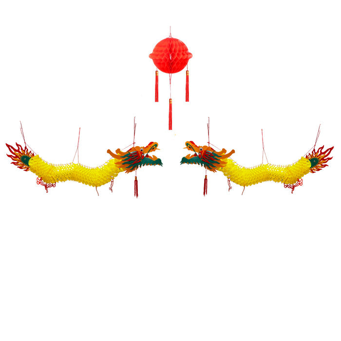 Colorful dragon decorations with a red paper lantern on a white background