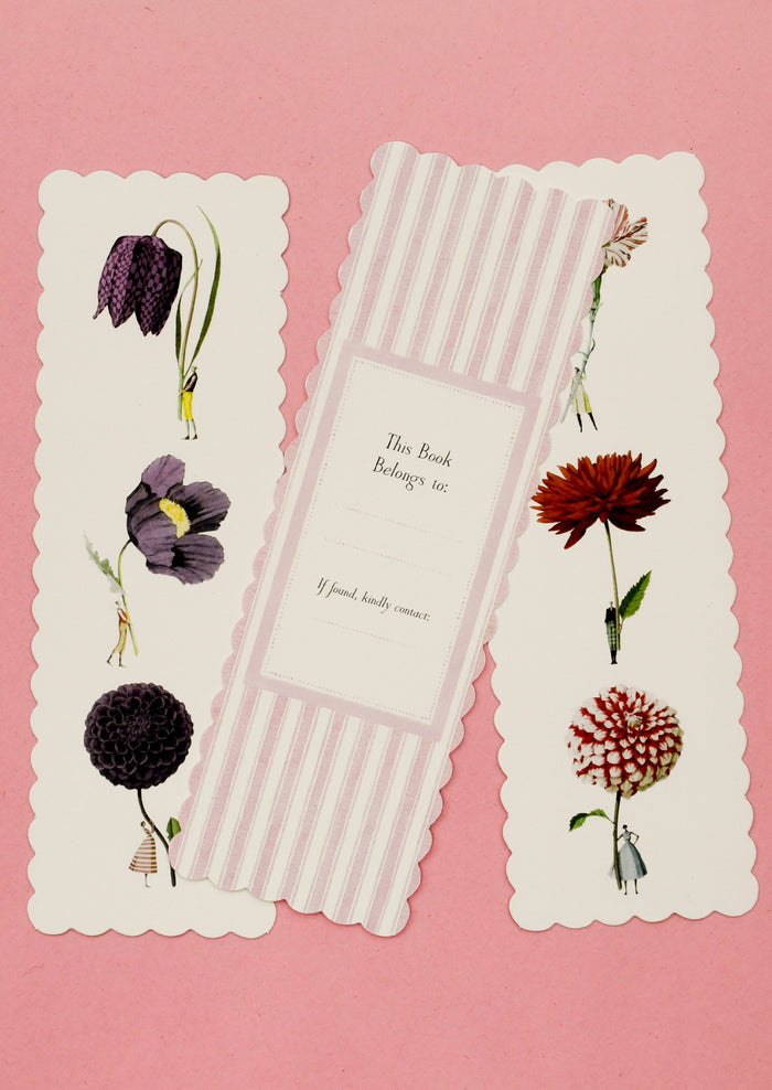 Floral bookmark with decorative border on a pink background