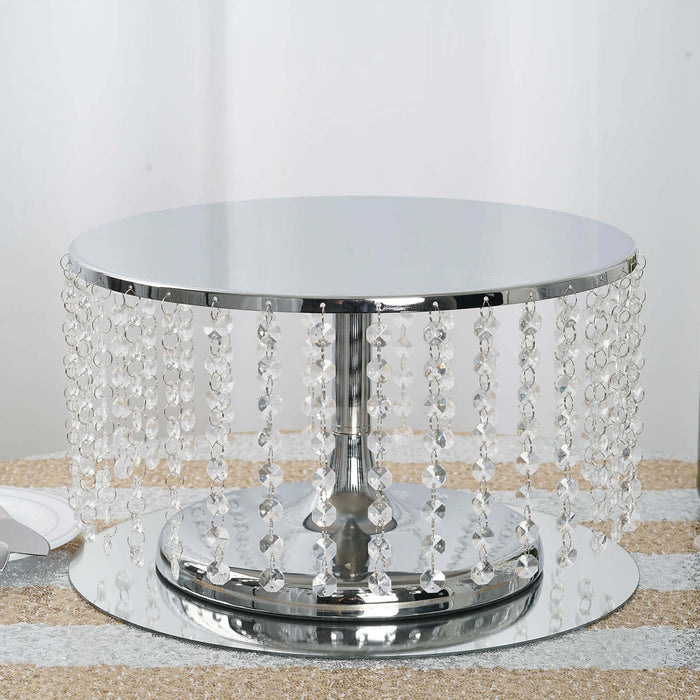 Mirrored round table with hanging crystal beads, elegant design for decor.