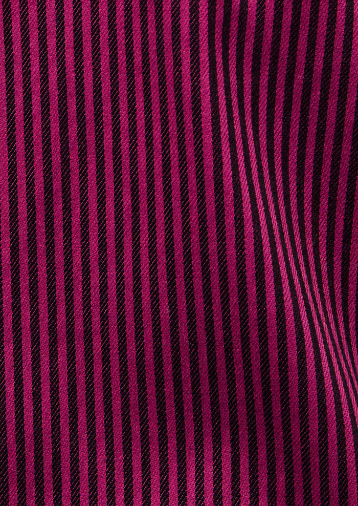 Close-up of pink and black striped fabric texture