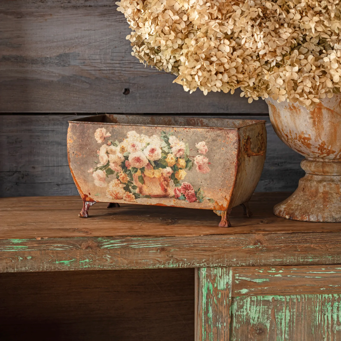 distressed floral container,
vintage trellis planter,
decorative flower box,
gathered rose centerpiece,
shabby chic metal container,
tole garden decor,
romantic planter box,
French cottage planter
