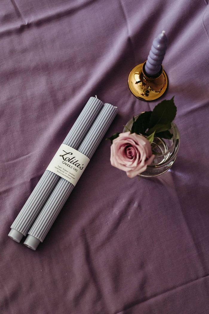 unscented lilac pillar candles, soy beeswax taper candle, eco-friendly taper candles, clean burning decorative candle, sculptural lilac candles, hand poured candle set, pastel purple home decor candles, Rome pillar candle lilac, natural wax dripless candle, non-toxic table candles