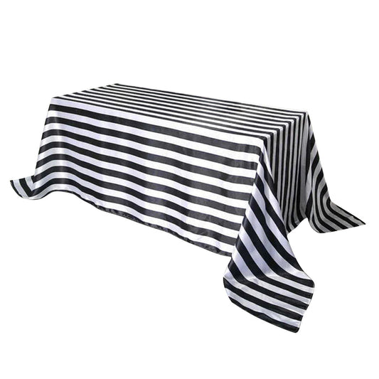 Black and white striped tablecloth on a plain background