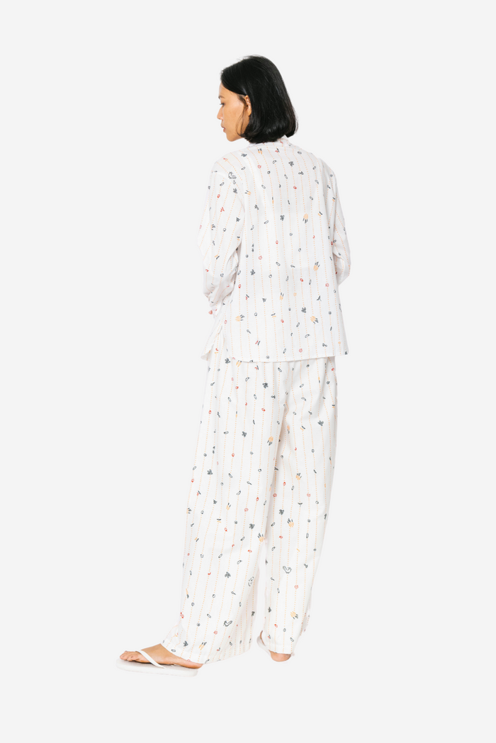 "Sejauh Mata Memandang X Dian Sastrowardoyo" "Tumbuh" - Woman's Tilem Pajama Top
