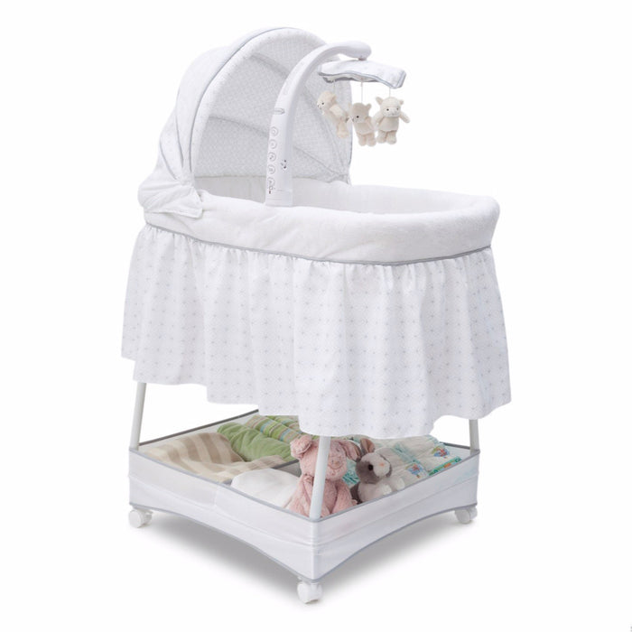 Delta Children Ivory (124) Slumber Time Elite Gliding Bassinet, Right Side View a1a