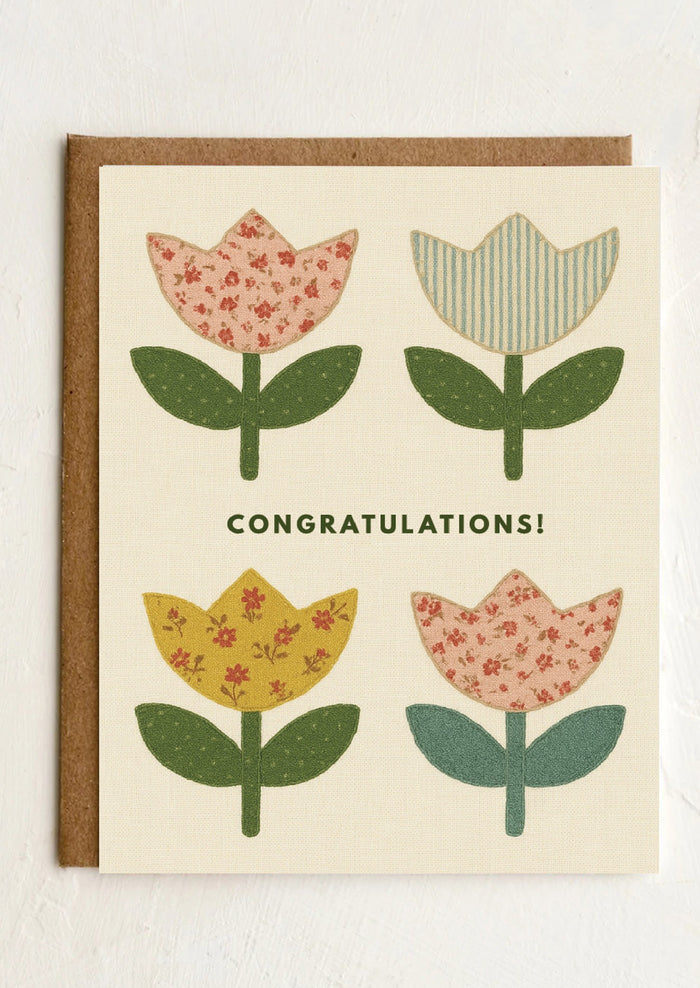 Greeting card with floral design and 'Congratulations!' text on a white background