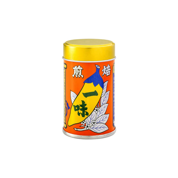 Colorful cylindrical container with a yellow lid on a white background